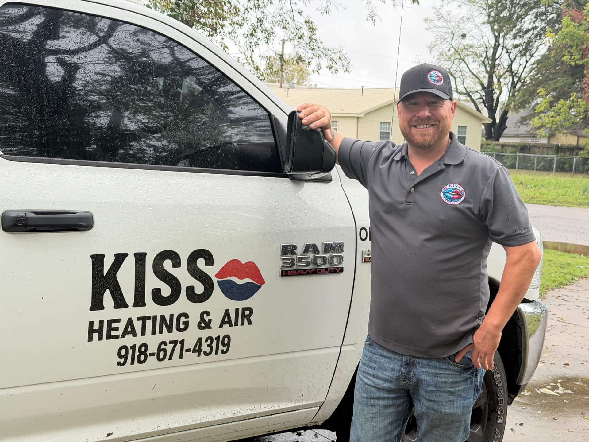 Brandon McBee with the KISS Heating and Air truck in Tulsa