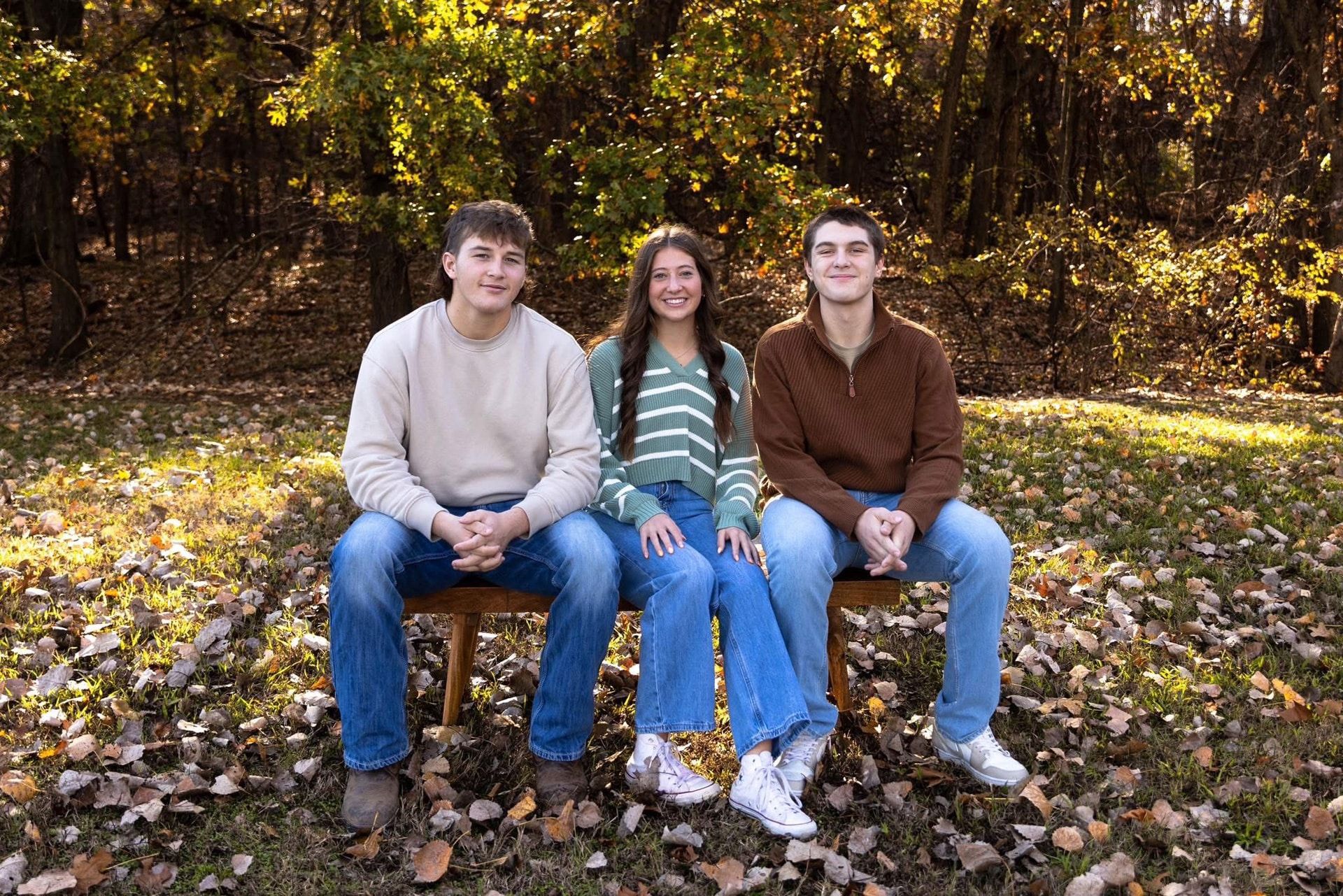 The McBee family outdoors in the fall